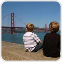 two boys looking at the Golden Gate bridge