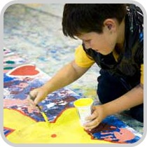 boy painting a