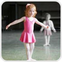 girl taking a ballet lesson