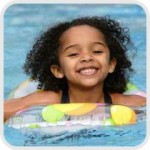 little girl swimming