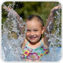 girl splashing in water