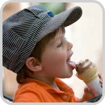 boy wearing a train hat