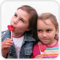 girls with valentines candy